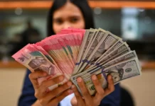 Rupiah Tembus Rp18.014 per Dolar AS, IHSG Anjlok Lebih dari 3 Persen di Awal Perdagangan Rupiah